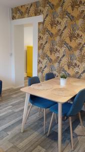 Appartements La maison citadine, avec garage : photos des chambres