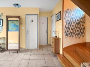 Maisons de vacances Maison cosy avec grand jardin : photos des chambres