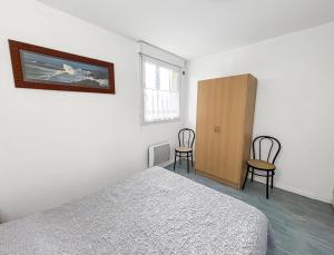 Maisons de vacances Maison cosy avec grand jardin : photos des chambres