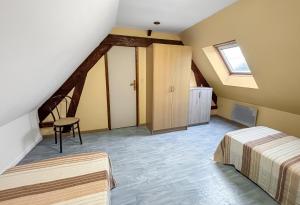 Maisons de vacances Maison cosy avec grand jardin : photos des chambres