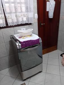 Casa Cond Fechado Aconchegante em Praia Grande e Wi-Fi