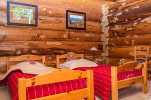 Appart'hotels Le Couaroge Chalets et Appartements : photos des chambres