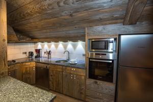 Appart'hotels Le Couaroge Chalets et Appartements : photos des chambres