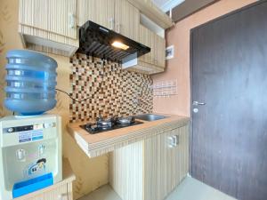 Spacious and Serene Studio Room Apartment at Jarrdin Cihampelas By Travelio