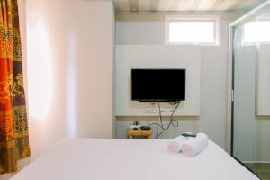 Modern Furnished 3BR at Springlake Summarecon Bekasi Apartment By Travelio