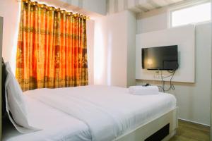 Modern Furnished 3BR at Springlake Summarecon Bekasi Apartment By Travelio