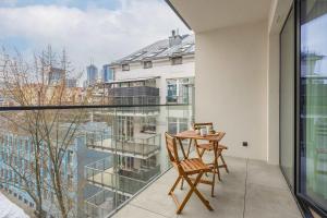 CHRONOS APARTAMENTY with Parking and Air Conditioning in Warsaw Wola by Renters Prestige