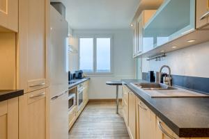 Appartements Cocon Lumineux - Parking gratuit : photos des chambres