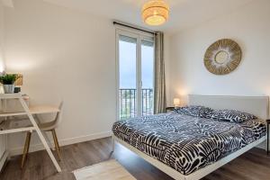 Appartements Cocon Lumineux - Parking gratuit : photos des chambres