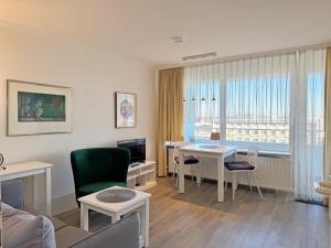 Haus Metropol App 113 direkt am Strand mit Balkon Cityblick