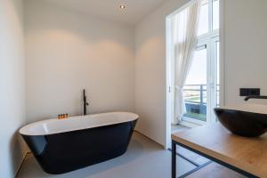 Vakantiewoning aan het water - met dakterras en balkon - Vista Maris - Nr 48