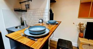 Appartements La Cachette Oubliee : photos des chambres