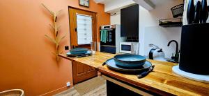 Appartements La Cachette Oubliee : photos des chambres