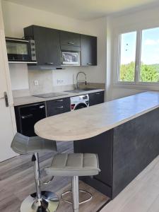 Appartements Grand T2 tout confort au calme avec terrasse : photos des chambres