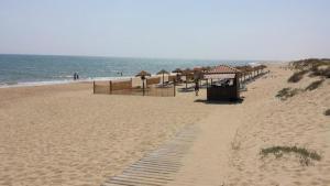 Casa en El Portil - 3-Bedroom Holiday Home including Paddle Tennis and Pool Near Golf Course