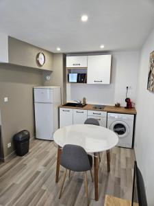 Appartements Studio cosy a 5min a pieds de la gare : photos des chambres