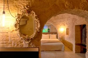 Apulian Trulli Nigri Holidays with private swimming pool