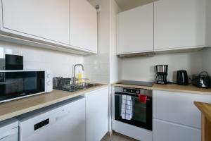 Appartements Les Marronniers - A 15min du Stade de France : photos des chambres