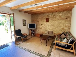 Maisons de vacances Le Noisetier at Les Hiboux Gites : photos des chambres