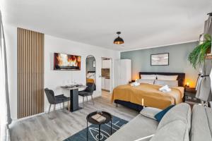 Hellohome I Gemütliches City Studio mit großer Dachterrasse & Parkplatz