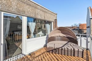 Hellohome I Gemütliches City Studio mit großer Dachterrasse & Parkplatz