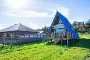 Chalets Le Tipi Bleu TINY HOUSE neuve avec terrasse et jardin : photos des chambres