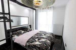 Appartements Home Angel spa : photos des chambres