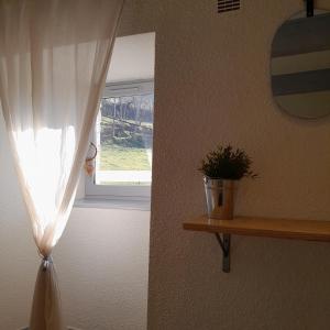 Appartements Gite NOCTUA chez Gites QUE CANTA : photos des chambres
