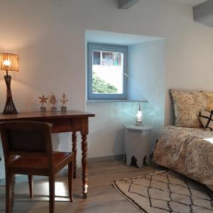 Appartements Gite NOCTUA chez Gites QUE CANTA : photos des chambres