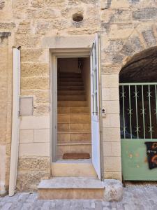 Appartements La Grande Bourgade-Authentique Maison en Pierre avec Terrasse Climatisation au Coeur d-Uzes : photos des chambres