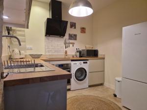 Appartements La Grande Bourgade-Authentique Maison en Pierre avec Terrasse Climatisation au Coeur d-Uzes : photos des chambres