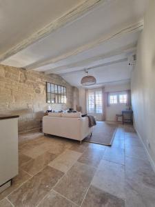 Appartements La Grande Bourgade-Authentique Maison en Pierre avec Terrasse Climatisation au Coeur d-Uzes : photos des chambres