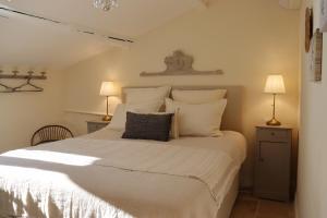 Appartements La Grande Bourgade-Authentique Maison en Pierre avec Terrasse Climatisation au Coeur d-Uzes : photos des chambres