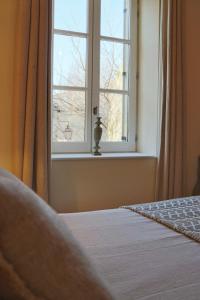 Appartements La Grande Bourgade-Authentique Maison en Pierre avec Terrasse Climatisation au Coeur d-Uzes : photos des chambres