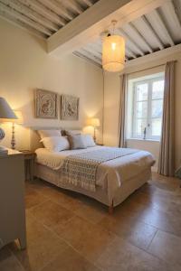 Appartements La Grande Bourgade-Authentique Maison en Pierre avec Terrasse Climatisation au Coeur d-Uzes : photos des chambres