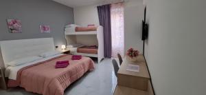 Chambre Quadruple avec Salle de Bains Privative