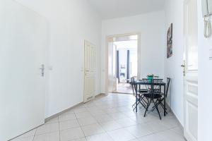 Peaceful and Stylish 2 BR Apartment Cozy Atmosphere