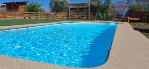 Cabaña Refugio Magenta con piscina privada tinaja costo adicional