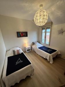 Appartements Residence Le Clos Des Baines - 047 - Magnifique appartement classee 3 avec vue sur l-ocean MAE-9651 : photos des chambres