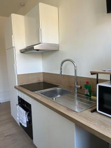Appartements Le Rivage - Gare, Wifi, Parking, TV : photos des chambres