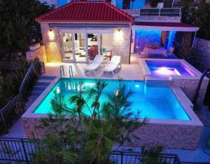 Seaside apartments with a swimming pool Pisak, Omis - 23884