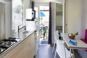 Maisons de vacances Lodge 4 Pieces 7 Personnes 1 bebe : photos des chambres