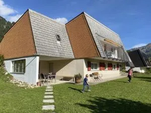 Familienfreundliche Ferienwohnung mit Spielwiese Haus Reanchme Parterre - b48833 - Flühli