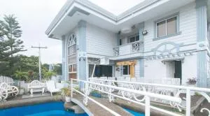 RedDoorz Premium at THE GRAND PENINSULA SUITES - Dinalupihan