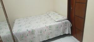 Casa com piscina e churrasqueira para família