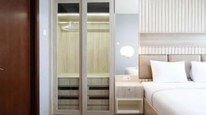 Nice and Relax 1BR at Grand Sungkono Lagoon Apartment By Travelio