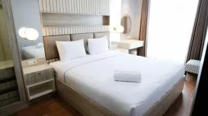 Nice and Relax 1BR at Grand Sungkono Lagoon Apartment By Travelio - Kedurus