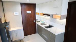 Nice and Relax 1BR at Grand Sungkono Lagoon Apartment By Travelio