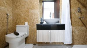 Nice and Relax 1BR at Grand Sungkono Lagoon Apartment By Travelio