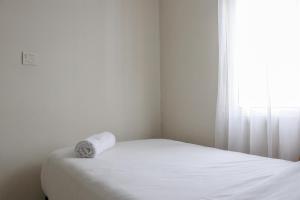 Tranquil Designed and Homey 2BR at Springlake Summarecon Bekasi Apartment By Travelio